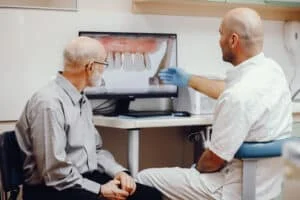 old man sitting dentist s office